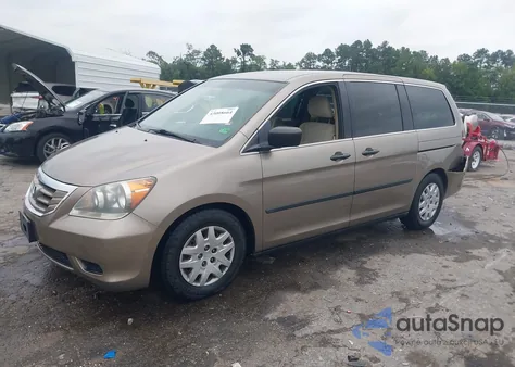 2010 Honda Odyssey Lx z USA, uszkodzony, nr VIN 5FNRL3H29AB009627
